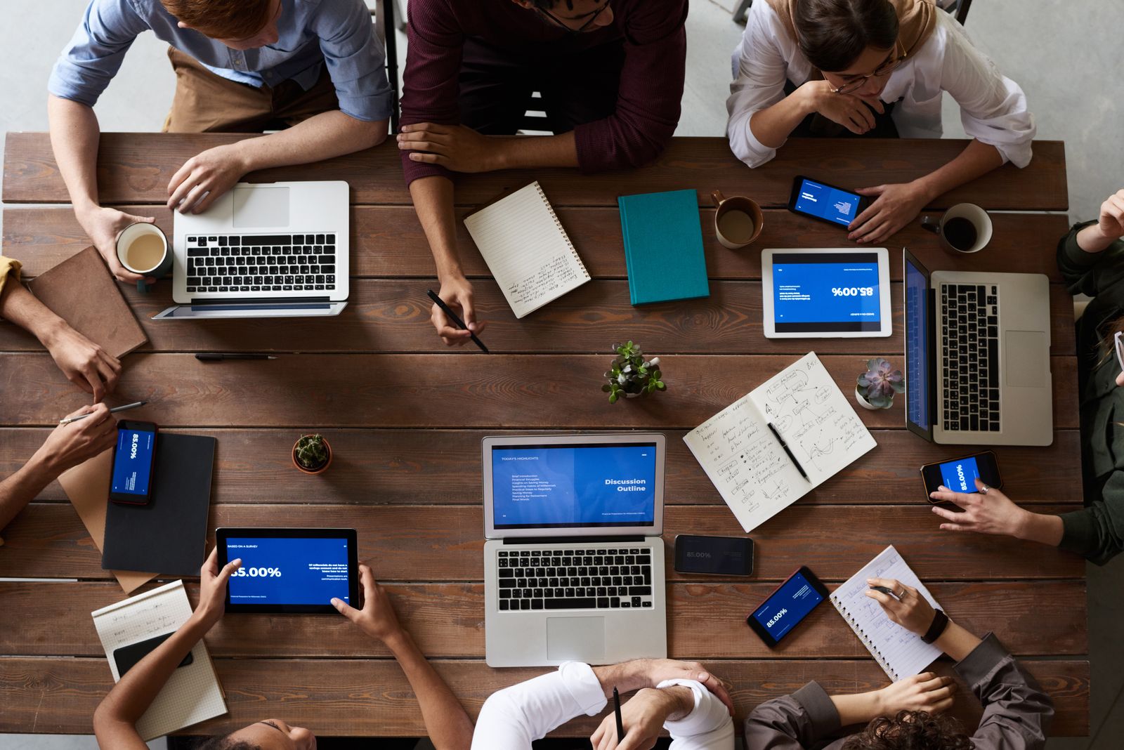 A team planning cloud partnership work around a table